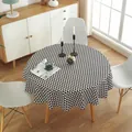 Macro shot of circular cotton linen tablecloth with black and white geometric triangle pattern - Black and White Triangle