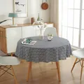 Close-up of blue and white wave pattern on linen round tablecloth with premium drape - Wave