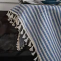 Close-up of blue and white striped cotton linen fabric with elegant white tassel edge - 150cm x 45cm / Blue Stripe (Grommet Style)