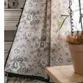 Linen floral curtain with black peony prints and tassels in a cozy rustic room setting - Peony Pattern With Black Tassel Hook Style