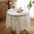 Detail of white lace tablecloth with intricate crochet floral patterns and wavy edges - 120*120cm / White Lace Style