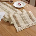 Cotton linen table runner with geometric stripes and tassels on a wooden dining table - Beige Brown Twist Style / 30x120cm