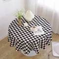 Minimalist black and white checkered round tablecloth in a cozy Nordic home setting - Black and White Plaid