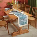 Close-up detail of high-density jacquard fabric table runner with blue floral patterns - Oil Painting Style Tassels / Short Style