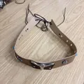 Detail of vintage leather hat band with silver bull head and blue beads on wood background - 56-58cm / Dark Brown Metal Bull Head with Rivets and Blue Decorative Beads Choker (AB295)
