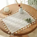 Beige rectangular hollow lace table runner with tassels on a wooden dining table - Beige Clover With Tassels