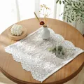 Detailed view of white floral lace square placemat with elegant wavy scalloped edges - French Embroidery Rolled Edge