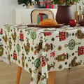 Detailed view of digital print Christmas tablecloth with holiday motifs on rectangular dining table - 100cmx140cm / Christmas Lantern Pattern