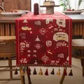 Close-up of red festive table runner with jacquard patterns, tassels and Chinese motifs - 35x140cm / Prosperity Style