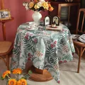 Detail einer runden Tischdecke aus Baumwollleinen mit tropischen Palmen und Blumen - 90*90cm / Grüne Pflanzen