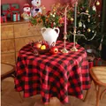 Detail of red and black buffalo plaid round tablecloth with cozy Christmas decor - Small Round / Red Black Buffalo Plaid
