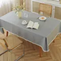 Mantel gris impermeable con ribete de encaje blanco en un ambiente hogareño moderno - 100*140cm / Gris