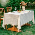 Macro view of beige lace tablecloth with geometric patterns and cotton tassels - 60x60 / Beige Clover Pattern (Tassel Style)