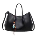 Minimalistische schwarze Tasche mit Lychee-Struktur, Tragegriffen und Gurt für Damen - Schwarz