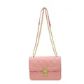 Elegante borsa a tracolla trapuntata rosa con catena dorata e chiusura a girello - Rosa
