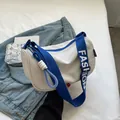 Minimalist white crescent dumpling bag with a blue fashion strap for casual crossbody wear - White with Blue