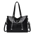 Fashionable black large-capacity tote bag in sleek faux leather with dual handles - Black