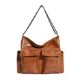 Brown vintage faux leather tote bag with large front pockets and adjustable shoulder strap - Brown