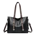 Borsa tote classica in pelle nera con manici marrone scuro e dettagli in metallo argento - Nero