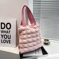Pink quilted bubble tote bag featuring diamond pattern and drawstring side detail - Pink