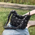 Chic black bubble texture cloud tote bag with puffy pleated design and wide shoulder strap - Black