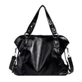 Glossy black PU leather tote bag with silver rivets and adjustable shoulder strap - Black