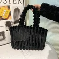 Chic black faux fur tote bag with striped texture and bubble handles for women - Black