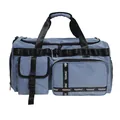 Blue travel bag with multiple pockets and durable black straps for gym and luggage - Denim Blue
