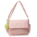 Roze canvas crossbody tas met verstelbare riem en groen bloemvormig hanger accessoire - Enkele Tas / Roze