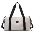 Water-resistant cream travel duffel bag with black straps and adjustable shoulder strap - Off White