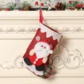 Calza di Natale in juta rossa con Babbo Natale 3D e dettagli a quadri rossi e verdi - Calza Decorativa Babbo Natale