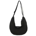 Minimalist black nylon dumpling bag with adjustable strap and woven zipper detail - Black