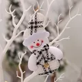 Pupazzo di neve natalizio in peluche con cappello e sciarpa a quadri bianchi e neri - Pupazzo di Neve a Quadri