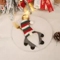 Christmas gnome cutlery holder with red and green knit hat on a white dinner plate - Gray Body Style (L-SD57)