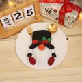 Christmas gnome cutlery holder with red plaid hat and holly leaf on a white plate - Top Hat Snowman (L-SD61)