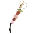 Close-up of cute potted plant silicone beads keychain with golden ring and tassel detail - Brown