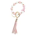 Dettaglio bracciale portachiavi in perline di silicone rosa con nastro e nappa in pelle - Fiocco Bianco Rosa (PZ230824931)