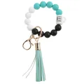 Detail of silicone bead wristlet with leather tassel and Good Vibes Only coffee cup charm - Green Coffee Cup
