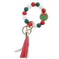 Dettaglio del bracciale natalizio in silicone con ciondolo a ghirlanda e nappa rossa - Stile Corona di Natale
