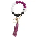 Detail of silicone bead wristlet keychain with fringe tassel and wife mom boss charm - Dark Purple Coffee Cup