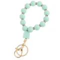 Macro detail of mint green silicone beads with rhinestone spacers and lobster clasp - Light Green Arch Charm Keychain Bracelet