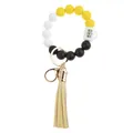 Detail of silicone bead wristlet keychain with leather tassel and mini coffee cup charm - Yellow Coffee Cup