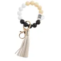 Detail of beaded wristlet keychain with white coffee cup charm and beige suede tassel - White Coffee Cup
