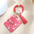 Bracciale di perline in silicone natalizio con portacarte alce rossa e nappa in pelle - Renna Rossa