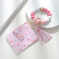 Detail of pink heart-printed PU card holder with silicone bead bracelet and tassel - 1 Heart-shaped Silicone Tote Bag