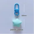 Süßer 20mm blauer Stern-Schlüsselanhänger aus Harz mit passendem Verschluss für Taschen - Blau