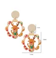 Acrylic Christmas reindeer earrings with green scarf and festive ornament patterns - Yellow Deer (5148221121002)