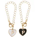 Golden heart-shaped keychain with letter P charm in black and white enamel finish - Black and White-Letter P