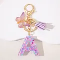 Resin letter A keychain with pink sequins, purple tassel, and butterfly charm - Letter A Purple Tassel