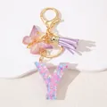 Detail of pink resin letter Y keychain with glitter heart sequins and purple tassel - Letter Y Purple Tassel